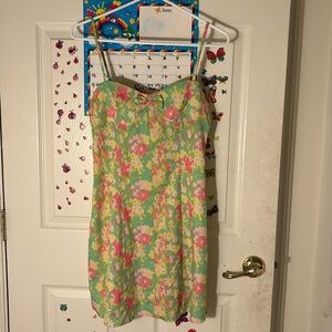 women’s green and pink floral dress